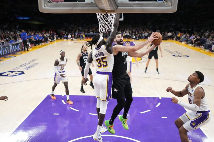 Lakers Mock Trade: Austin Reaves makes way for 6-foot-10 defensive big man on cheap contract