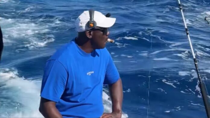 Michael Jordan enjoys cigars as he relaxes on board yacht after pocketing $400K in prestigious competition