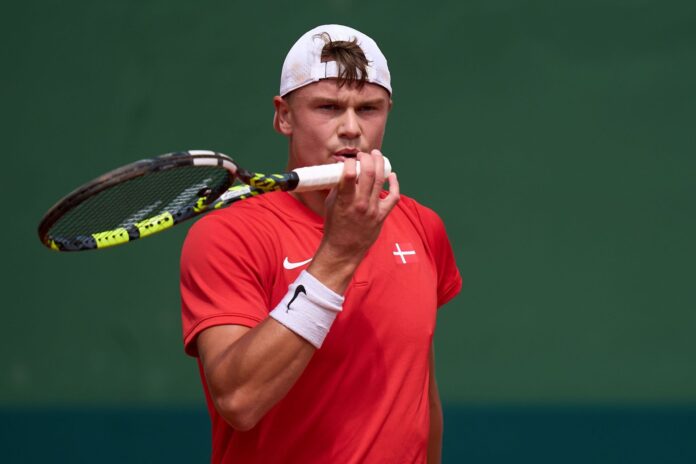 Controversy erupts at Davis Cup as Holger Rune’s mid-match injury treatment makes Spain captain David Ferrer furious, complaints raised with referee